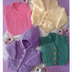 May include: Four knitted baby sweaters in different colours: pink, yellow, purple and green. The sweaters have different styles, including a hooded cardigan, a cardigan with pockets and a sleeveless vest.