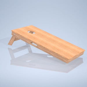 May include: A wooden cornhole game set with a natural wood finish. The game board is angled and has a hole in the center. The board is supported by two wooden legs.