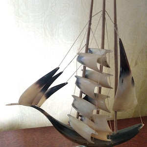 vintage sailboat model made from horn. Very beautiful sailboat.