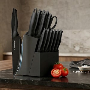 May include: A matte black knife block set containing multiple knives with black handles and blades. One knife is positioned outside the block, clearly labeled 8" Chef's Knife. The set includes various blade shapes and sizes for kitchen use.