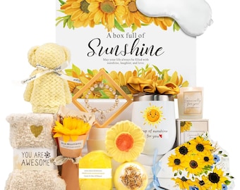 May include: A gift box filled with yellow-themed items, including a teddy bear, socks, a candle, a tumbler, and bath bombs. The box is decorated with sunflowers and the text "A box full of Sunshine."