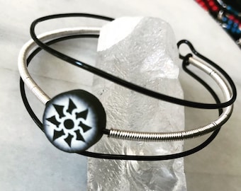 Dark Rapunzel inspired wire wrapped cuff bracelet