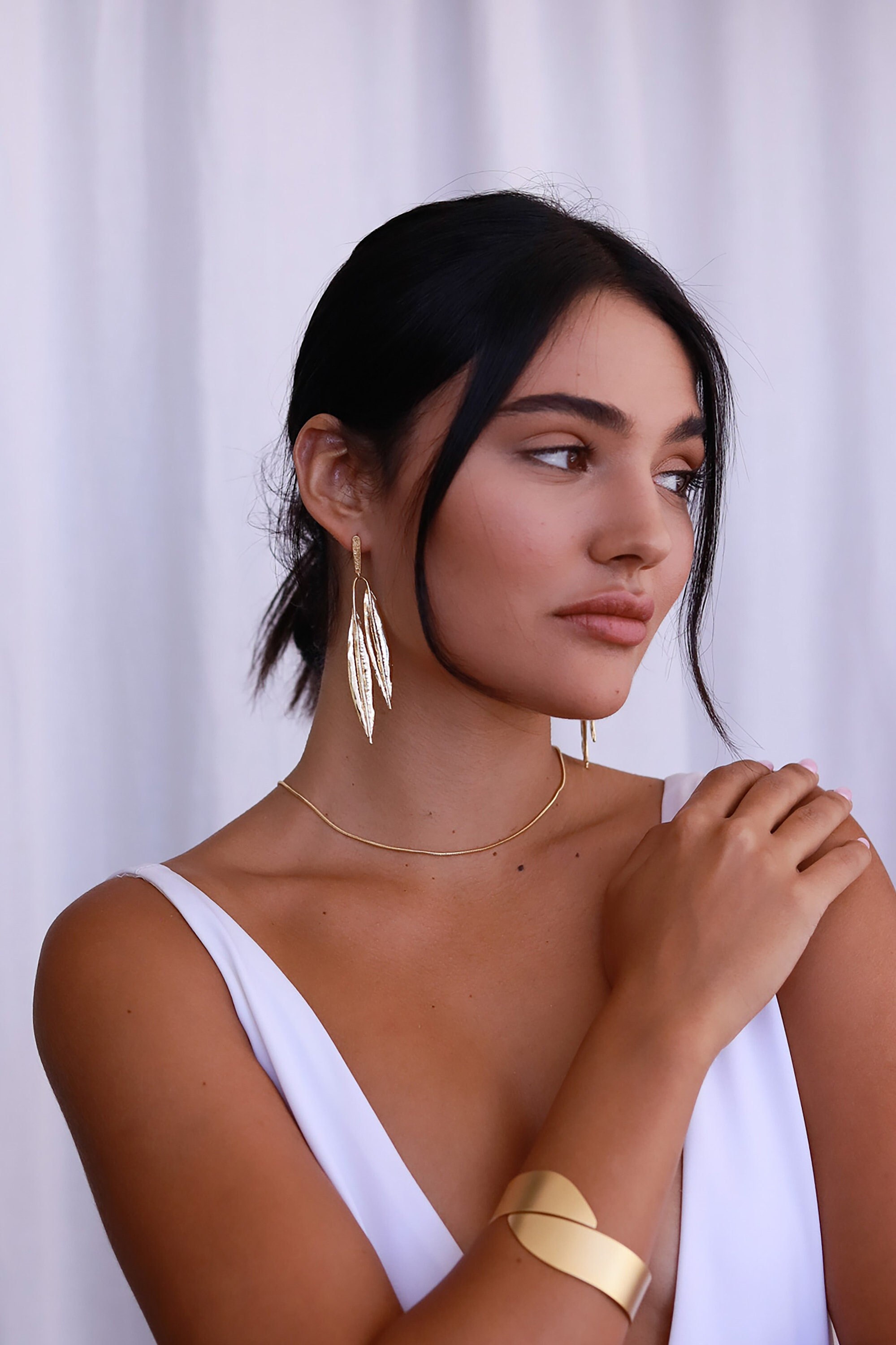 Long gold leaf earrings sale