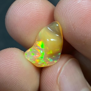 Amazing fire opal with its beautiful rain flashes and quarry inlays AAA quality. Weight 3.50 carats Measures 15X10X6 mm