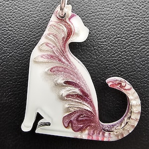 May include: A white ceramic mug with a black handle and the text "But First, Coffee" in a black, bold font. The mug is on a white surface. The mug is approximately 4 inches tall.