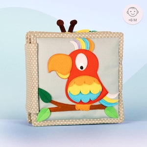 Quiet Book - Mini -Schillernder Papagei - Montessori Spielzeug ab 6 Monaten