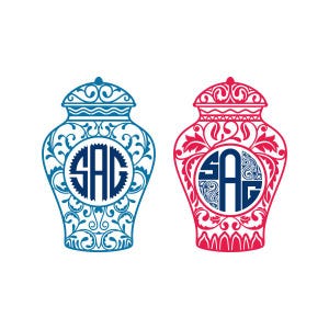 May include: Two decorative ceramic urns with intricate floral designs. The urns are blue and red with a white monogram "SAG" in the center.