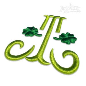 May include: Green embroidered patch with the letter "J" in a cursive font and three shamrocks.