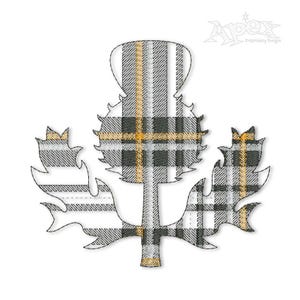 May include: A black and white tartan thistle with yellow accents. The thistle is a traditional Scottish symbol.