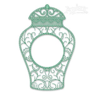 May include: A green embroidered design of a decorative vase with a round opening in the center. The vase has a detailed floral pattern and a lid with a decorative top.