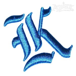 May include: Blue embroidered patch with the letter "K" in a gothic font style.