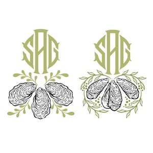 May include: Two olive green monogram designs with the letters "SAG". Each design features a cluster of black and white oyster shells surrounded by olive green leaves and berries. The designs are on a white background.