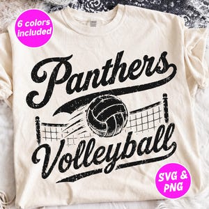 May include: A cream-colored t-shirt featuring a black distressed graphic print. The design displays the word Panthers above a volleyball and a net, with the word Volleyball below. Two pink circular badges state 6 colors included and SVG & PNG.
