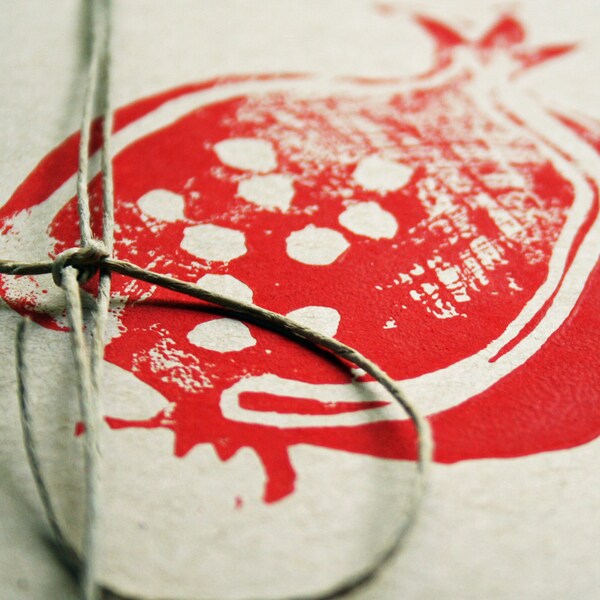 Pomegranate. Linocut block print.
