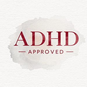 May include: A burgundy text on a watercolor background reads "ADHD APPROVED". The text is centered, with "ADHD" in a bold, serif font above "APPROVED", which is underlined. The background is a soft, gray and white watercolor wash.