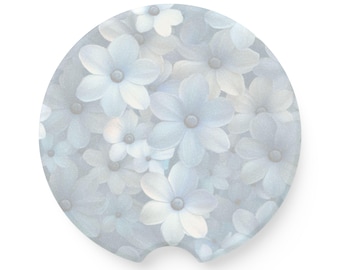 Gebloemde autoonderzetter van speksteen, blauwe en witte bloemen