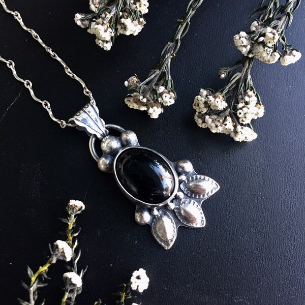 Tailfeather Sterling Silver and Onyx Pendant Necklace