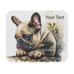 May include: A square mousepad featuring a watercolor illustration of a French Bulldog. The dog has tan and white fur, with a focused expression. The words "Your Text" are printed in black on the upper right corner. The background has watercolor-style splashes.