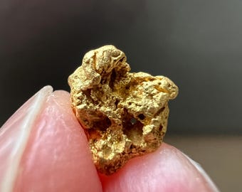 0.78グラムのオーストラリア産天然金塊、ユニーク、2つの大きな目、オーストラリア中央クイーンズランドの鉱山から直接採取、コレクション用