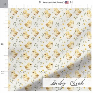 May include: Fabric with a repeating pattern of watercolor baby chicks, yellow flowers, and green sprigs on a white background. The text "Baby Chick" is displayed in a cursive font. The fabric is 16 inches wide.
