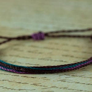Burgundy, turquoise and purple string surfer bracelet