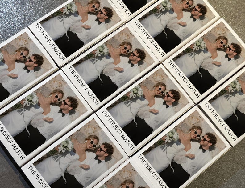 May include: Arrangement of rectangular cards featuring a couple wearing sunglasses, embracing, and holding flowers. The text "THE PERFECT MATCH" is printed on each card in a black, sans-serif font. The cards are arranged diagonally.