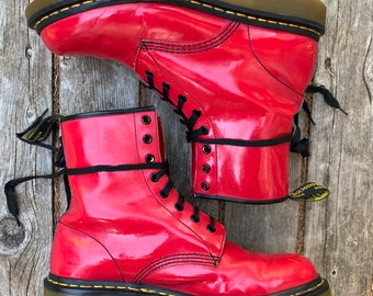 red shiny doc martens