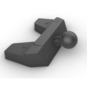 May include: A black plastic phone mount with a ball joint. The mount has two arms that can be adjusted to hold a phone in place.