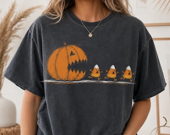 Pumpkin Chasing Candy Corn Shirt, Funny Halloween Tee, Scary Jack O Lantern T-Shirt, Comfort Colors