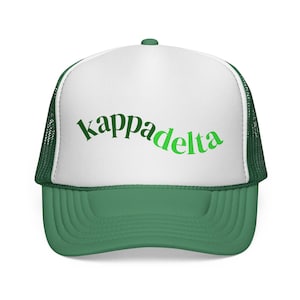 May include: A green and white trucker hat featuring the text "kappadelta" in green script. The hat has a green peak and a mesh back.