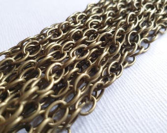 1 metre Antique Bronze Chain 7 x 5mm plated oval links - nickel free continuous chain