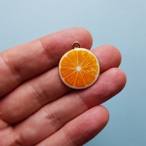 1 x Orange slice charm - clear enamel on a gold plated metal back - Fruit Pendant