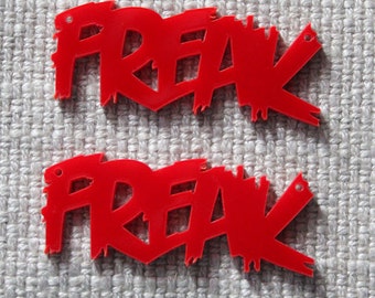 2 x laser cut acrylic Freak word pendants