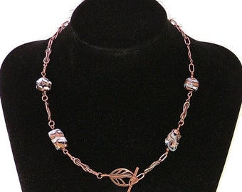 Copper Front Fastening Necklace With Foiled Glass Beads And Cast Rope Chain