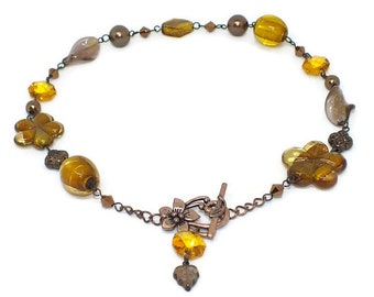 Asymmetrical copper necklace with lampwork beads