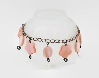 Peach mother of pearl copper charm bracelet
