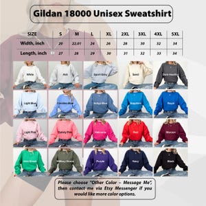Puede incluir: Sudadera unisex Gildan 18000 en varios colores. La imagen muestra una tabla de tallas con medidas de ancho de 50,8 a 86,36 cm y medidas de largo de 68,58 a 86,36 cm. Los colores disponibles incluyen blanco, gris deportivo y m&aacute;s.