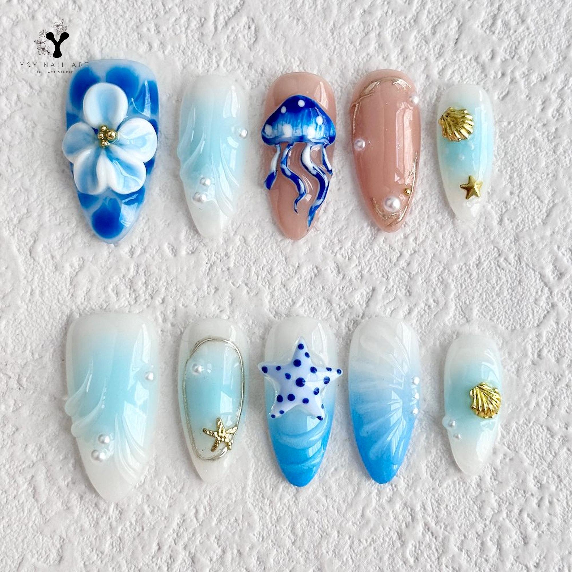 オーシャンプレスオンネイル | ブルークラゲの貝殻ネイルアート