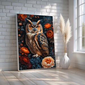 May include: A brown and black owl with yellow eyes perched on a branch of orange and blue flowers. The owl is surrounded by dark green leaves and orange flowers.