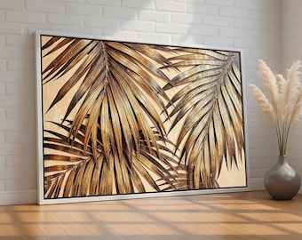 May include: A framed print of a close-up of golden palm leaves against a beige background.