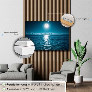 May include: A canvas print depicting a moonlit ocean scene. The artwork features a full moon over the water, with the moon's reflection creating a shimmering path. The canvas is available in 0.75" and 1.50" thicknesses and is ready to hang.