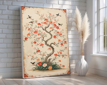 May include: A framed art print featuring a stylized tree with red flowers and small black birds. The artwork has a vintage aesthetic with a cream-colored background and a decorative border. The print is displayed in a bright room.