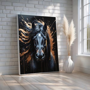 May include: A framed art print featuring a black horse with flowing mane and gold paint splatter details against a black background. The horse has a white marking on its forehead. The artwork is leaning against a white brick wall.