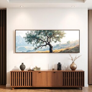 May include: A framed canvas print with a painting of an olive tree in a landscape setting. The text "I am like an olive tree flourishing in the house of God, I trust in God's unfailing love, Forever and Ever" is printed on the canvas.