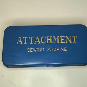 Vintage Blue Metal Sewing Machine Attachment box with Sewing accessories