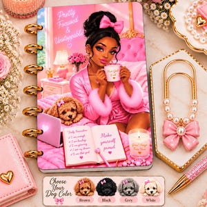 May include: A spiral-bound notebook featuring a pink-themed illustration of a person in a robe with a puppy, a laptop, and an open book with text. The cover includes the phrases Pretty Focused & Unstoppable, Hot Girl Fuel, and Make yourself proud.