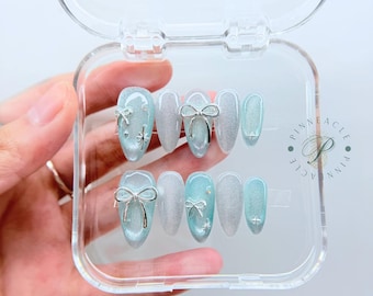 Silver Cat Eye Press On Nails, Blue Chrome Bow Nails, Icy Winter Nails, Metallic Almond Nails, Elegant Korean Nail Set