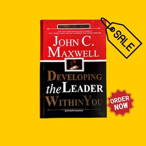 May include: A red, white, and black book cover with the title "Developing the Leader Within You" by John C. Maxwell. The book cover also includes the text "Over 1,000,000 sold" and "@homeofvirtuebooks".