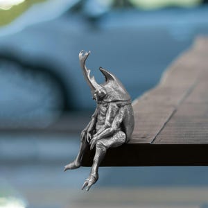 Mini Copper Rhinoceros Beetle Figurine, Insect Statue-Inspired Miniature Sculpture, Courage & Resilience Symbol, Sitting Insect Sculpture.