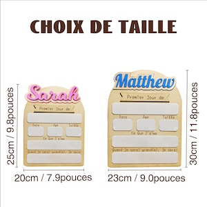 May include: Two wooden plaques, one with "Sarah" and the other with "Matthew" in colourful lettering. Each plaque has space for recording a child's first day, date, age, and size. The Sarah plaque is 20cm wide and 25cm tall, while the Matthew plaque is 23cm wide and 30cm tall.